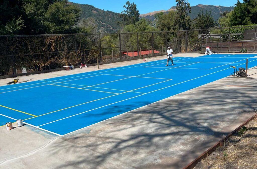 Tennis court installation and floor coating